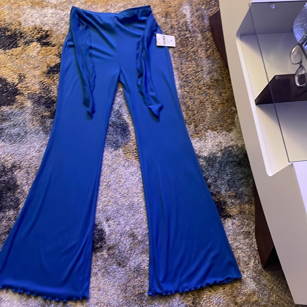 Blue Forever 21 stretch wide legged lettuce cut pants. Size M